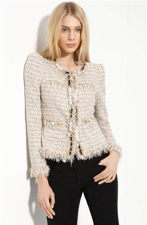 chanel boucle jacke|Chanel fringed tweed jacket.